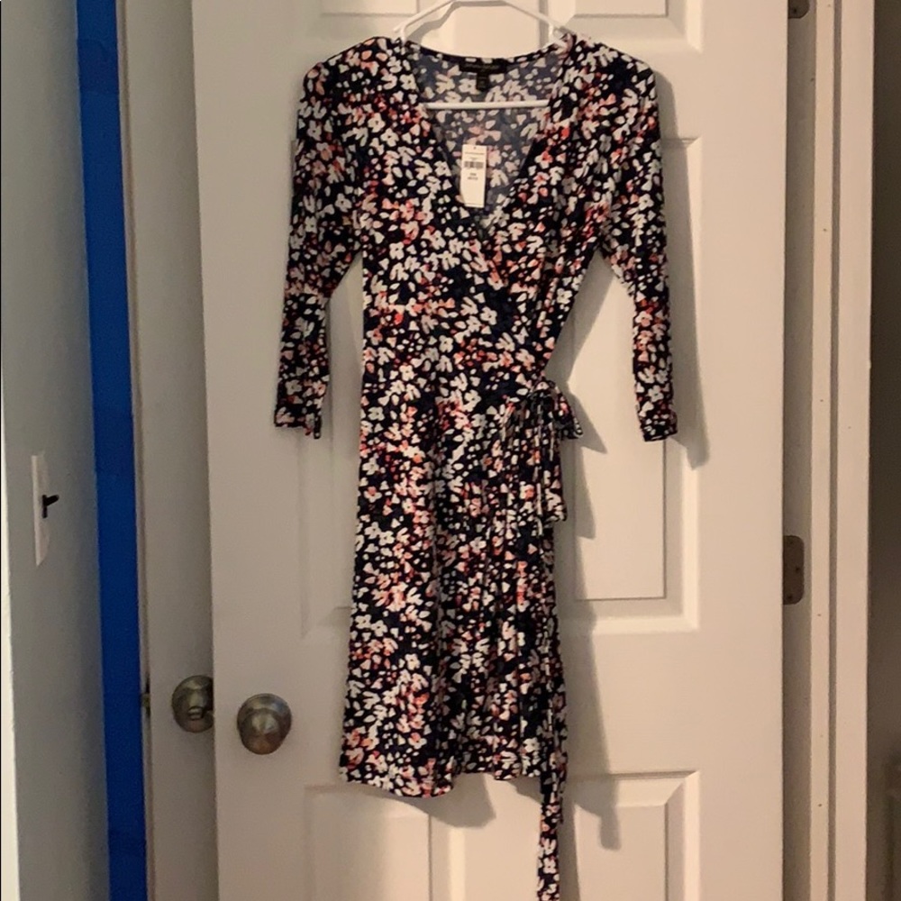New with tags . Petite XS floral wrap dress.